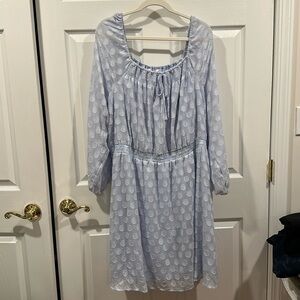 Long sleeve. Sheer sleeve. Dress with blow at front.